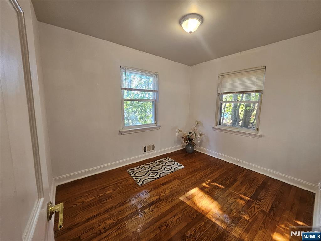 55 Rutgers Place River Edge, NJ 07661 - Photo 10 of 23 a view of an empty room and window