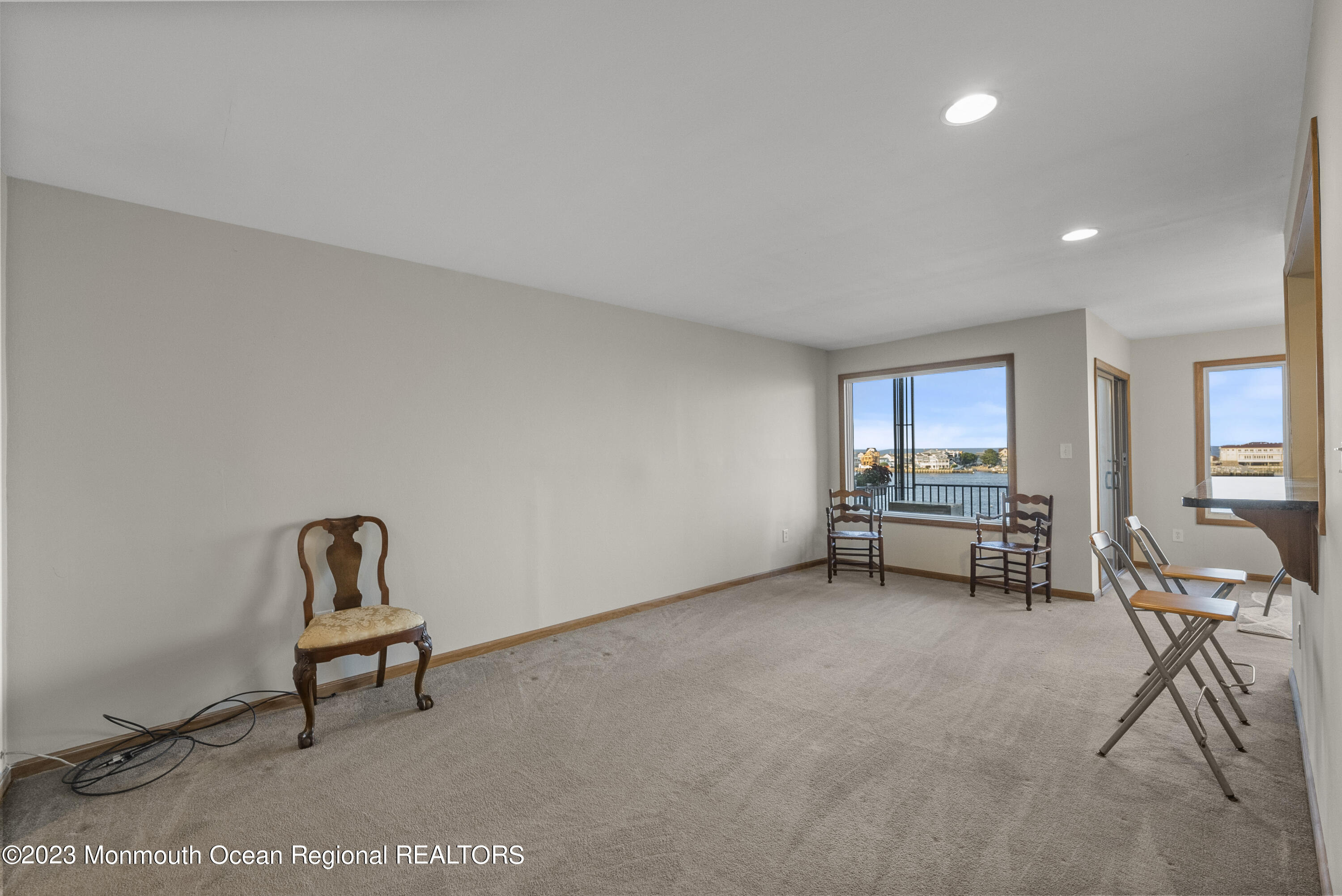 200 Portland Road, Unit A5 Highlands, NJ 07732 - Photo 14 of 30 a living room with furniture and a chair