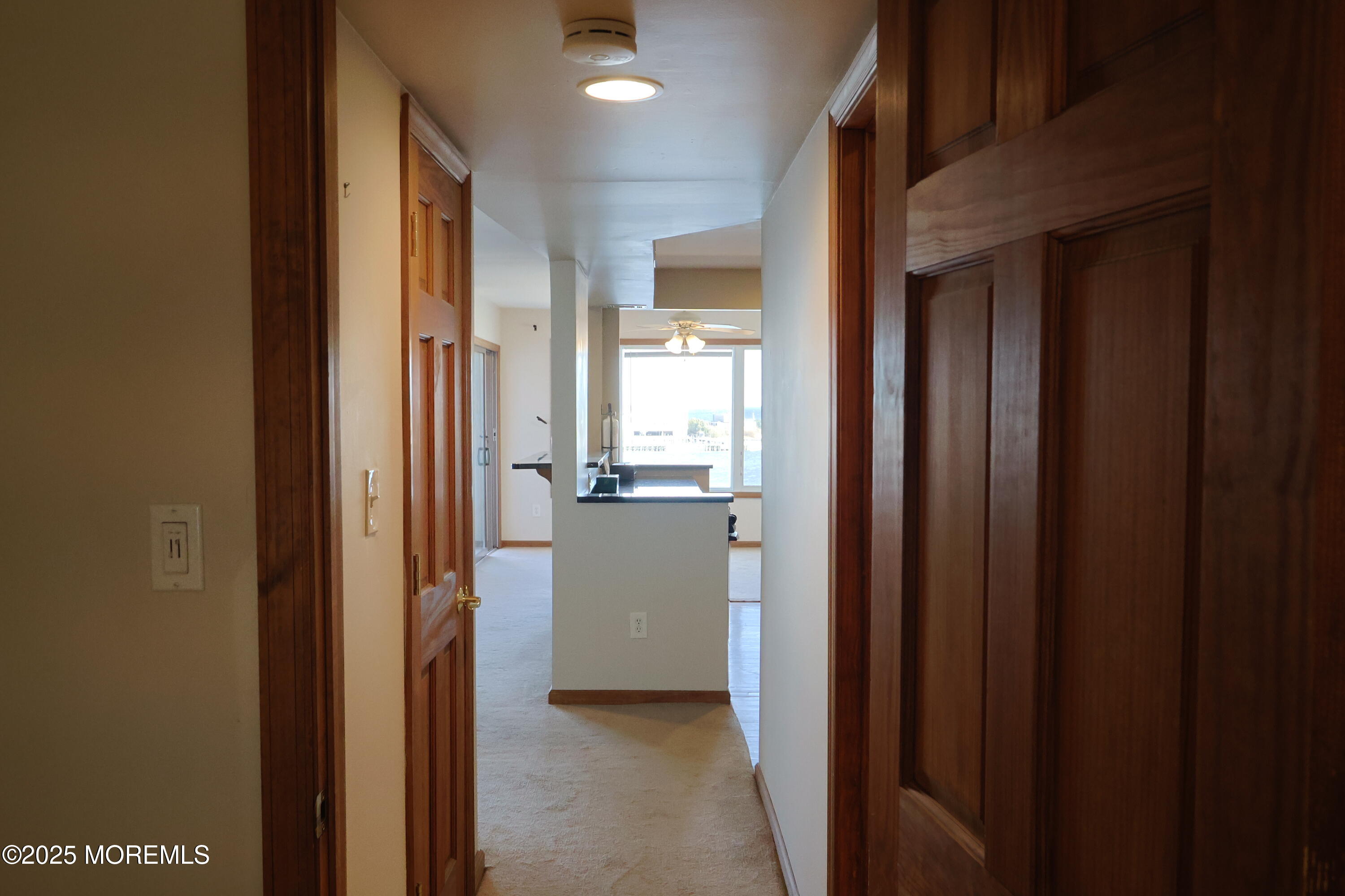 200 Portland Road, Unit A5 Highlands, NJ 07732 - Photo 28 of 30 a view of a hallway with a kitchen and dining room