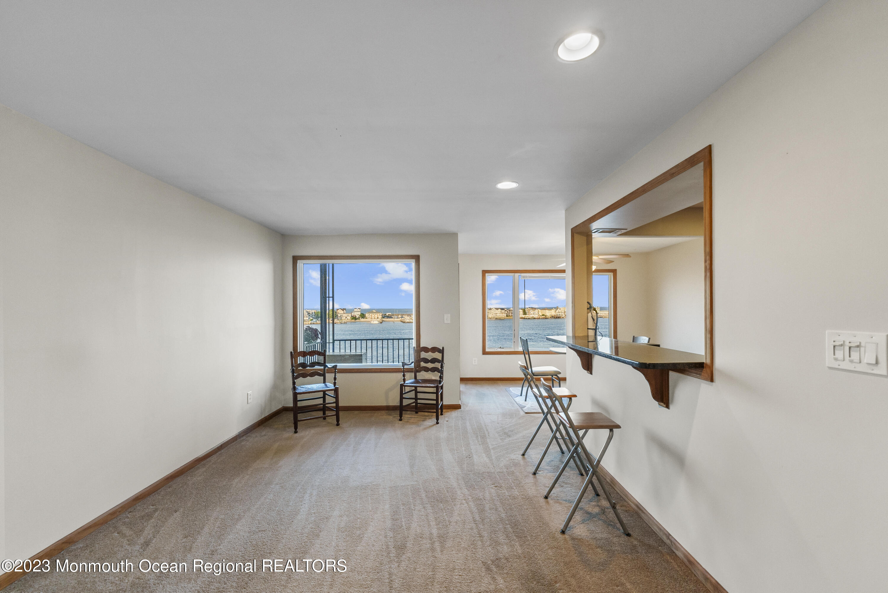 200 Portland Road, Unit A5 Highlands, NJ 07732 - Photo 5 of 30 a living room with furniture and a wooden floor