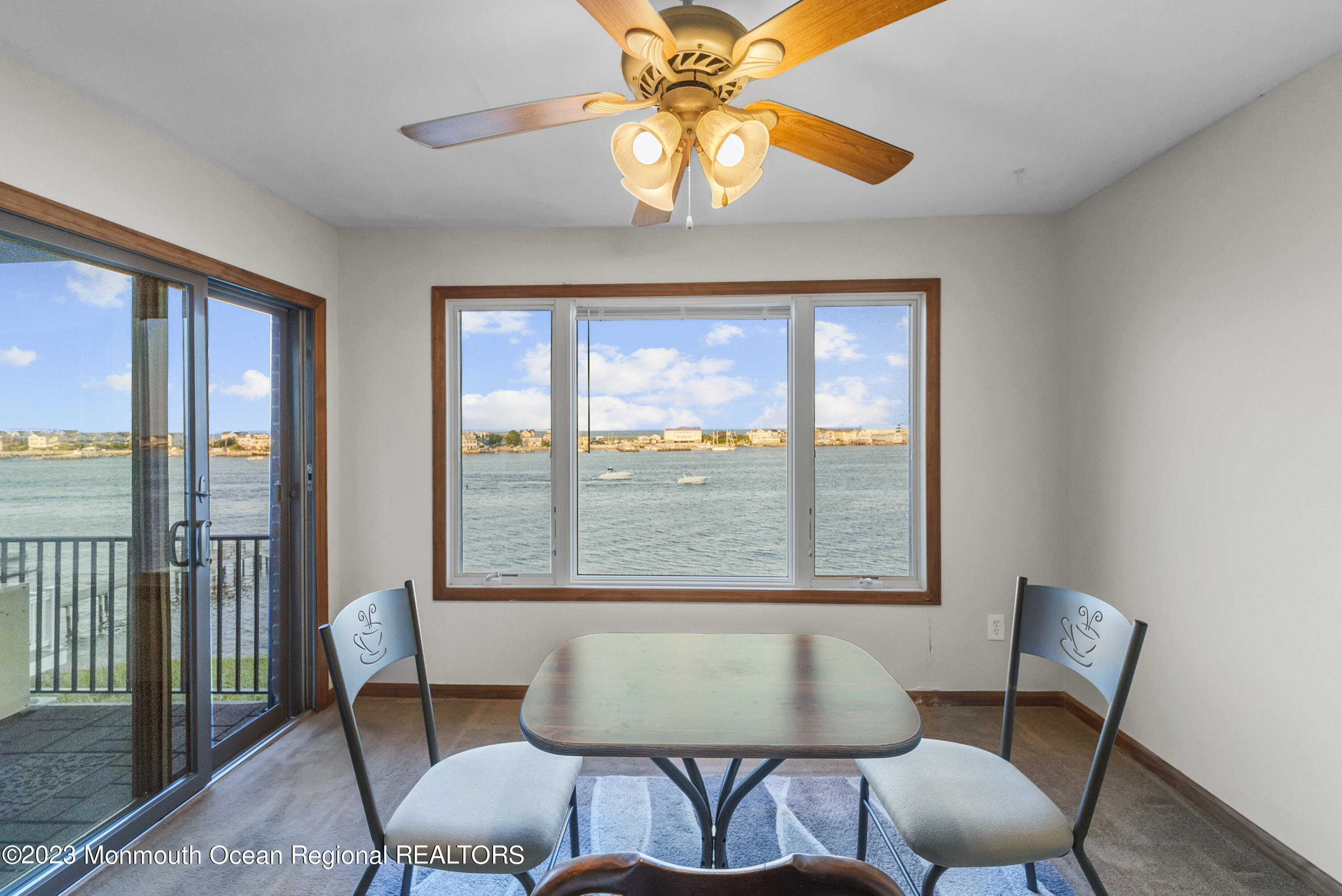 200 Portland Road, Unit A5 Highlands, NJ 07732 - Photo 7 of 30 a dining room with furniture and window