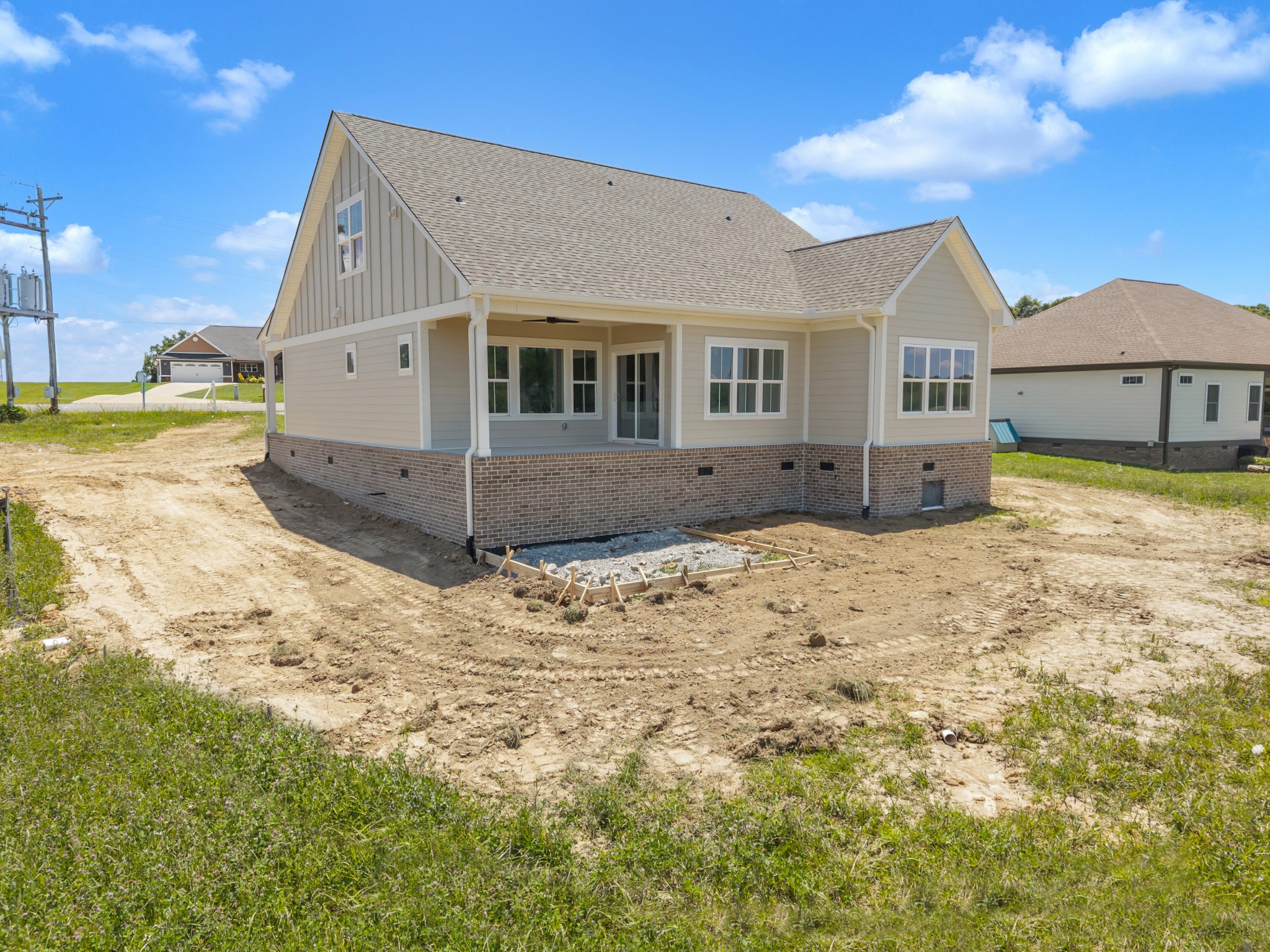 1171 Abiff Road Bon Aqua, TN 37025 - Photo 36 of 45 a view of a house with a yard