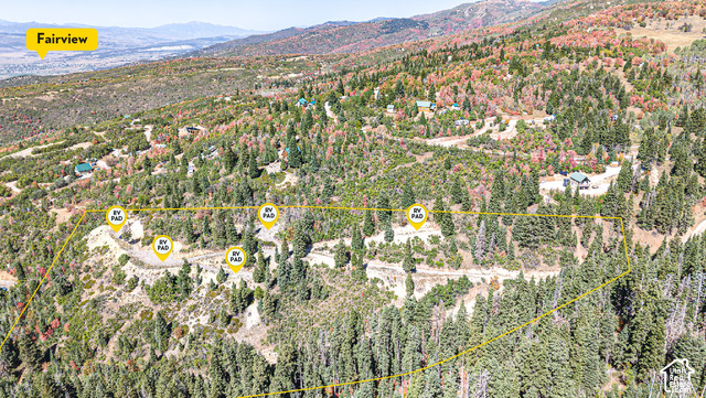 1197 East Quaking Hollow Road, Unit 1197 Mount Pleasant, UT 84647 - Photo 1 of 39 Expansive sloped terrain with abundant mature trees and mountainous backdrop