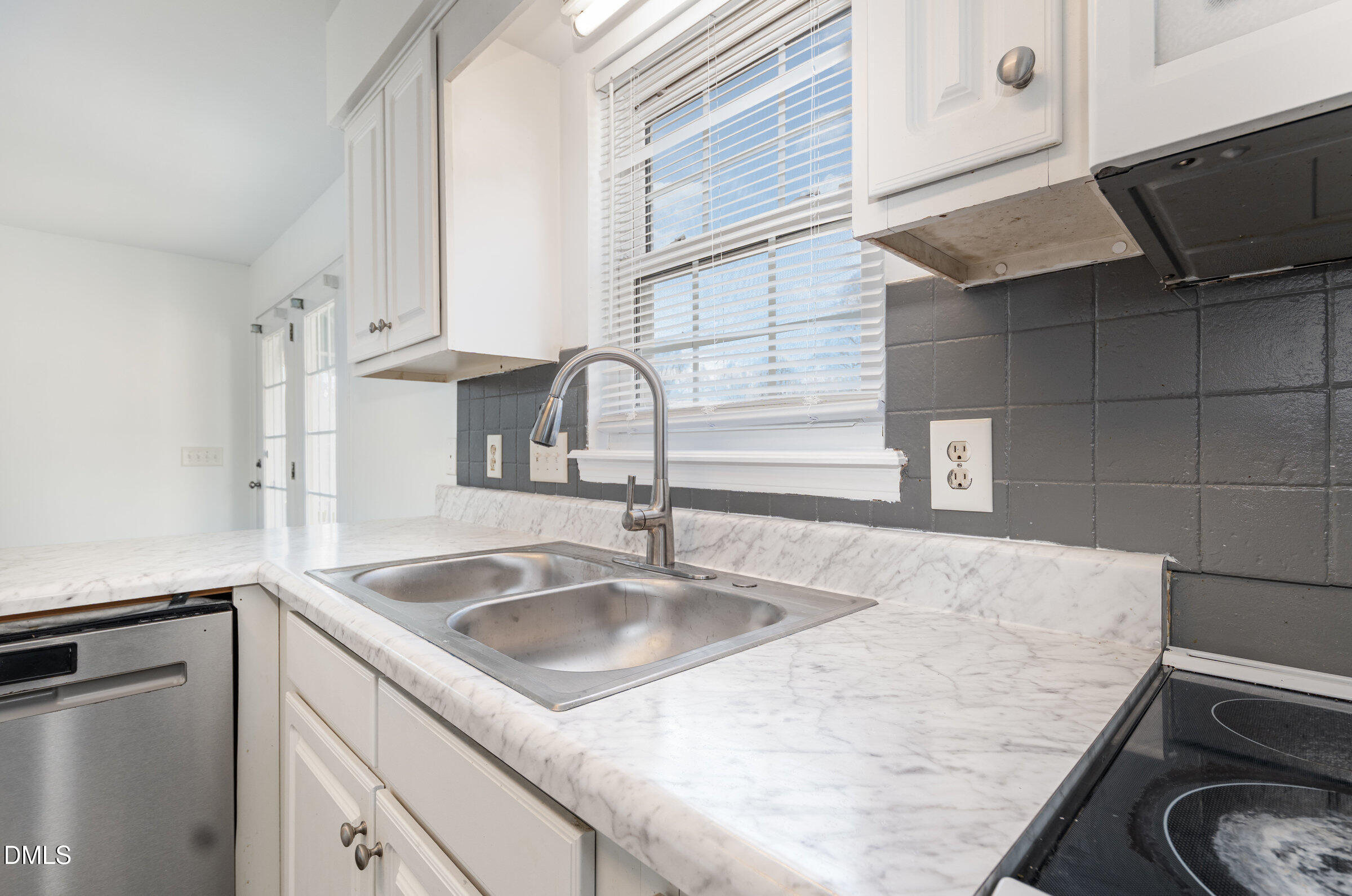700 Thompson Road Graham, NC 27253 - Photo 14 of 34 a kitchen with a sink and a microwave