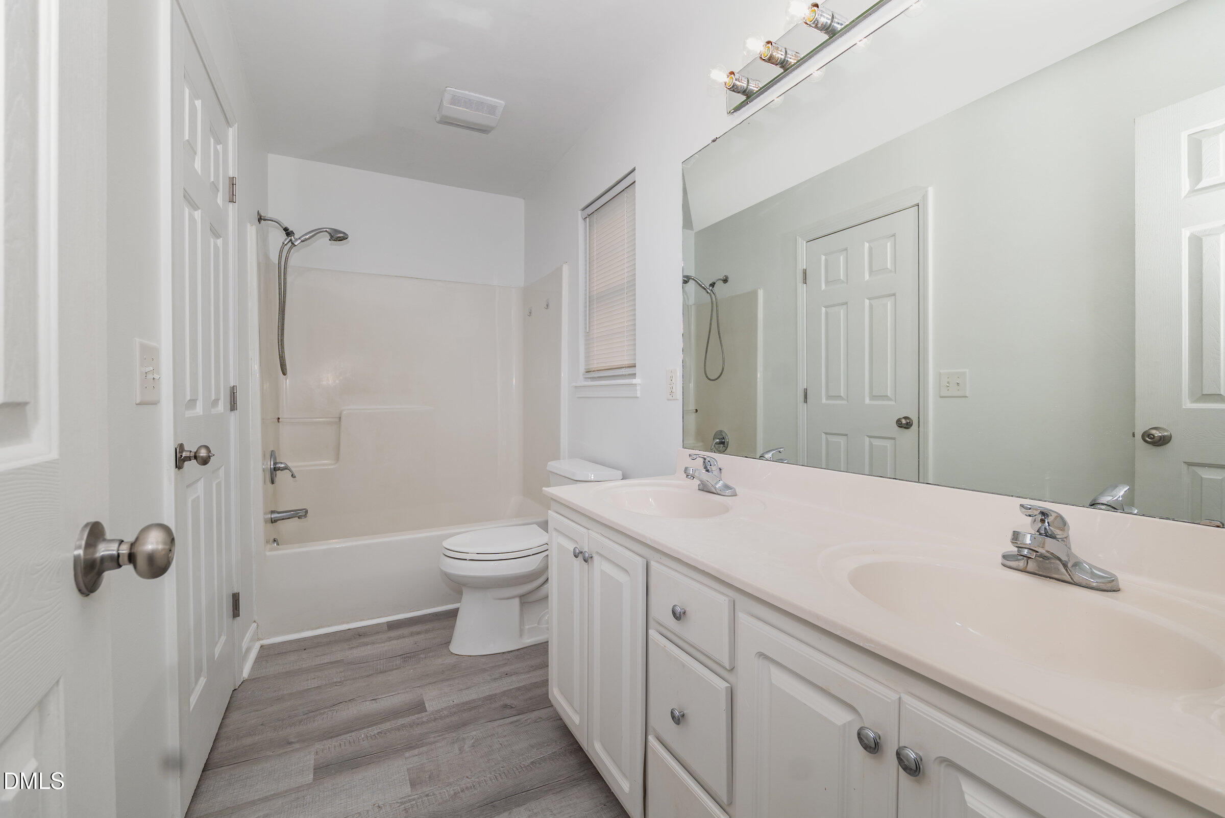 700 Thompson Road Graham, NC 27253 - Photo 21 of 34 a bathroom with a sink a toilet and shower