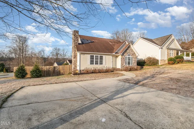 a house with yard in front of it