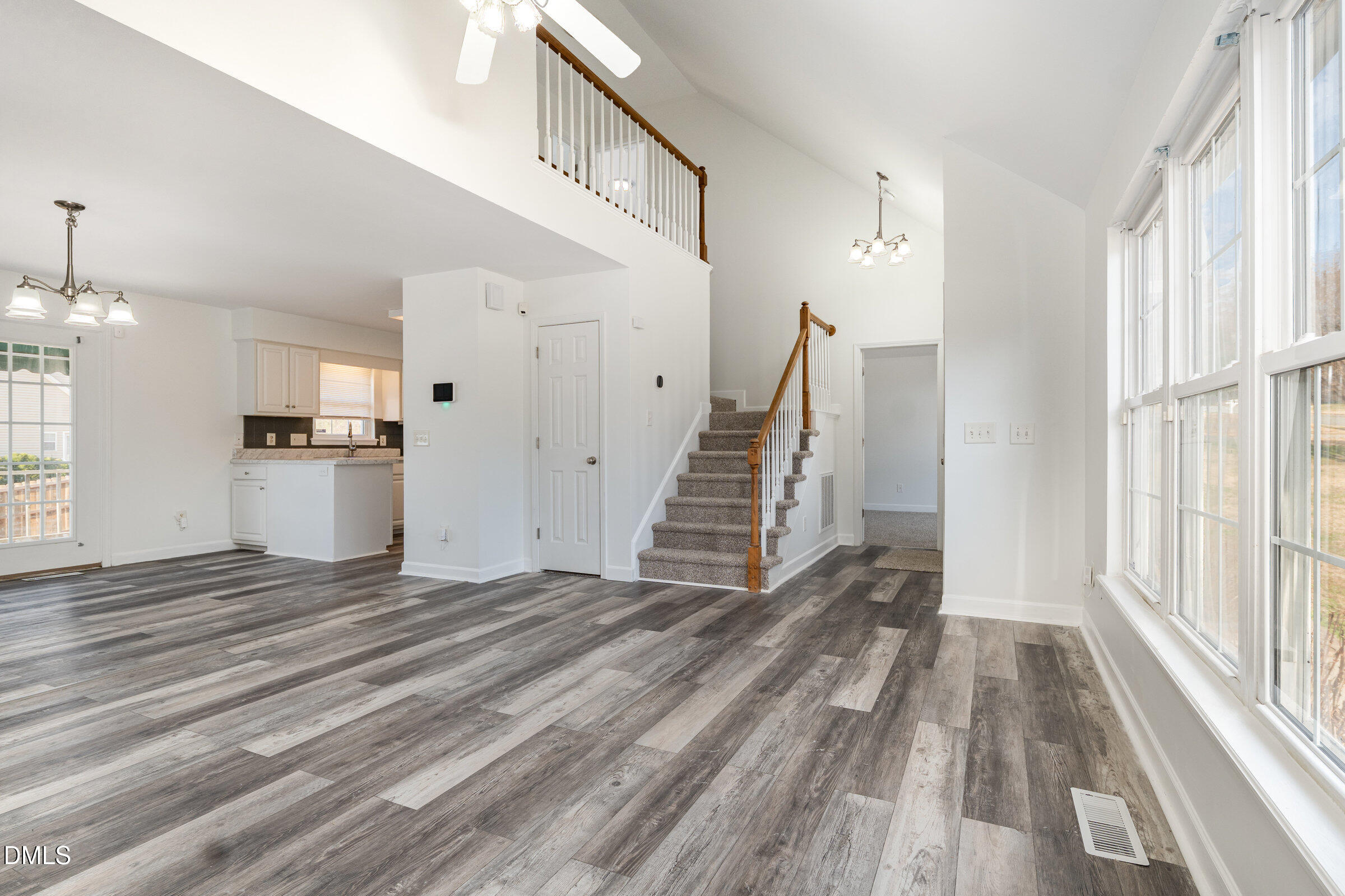 700 Thompson Road Graham, NC 27253 - Photo 6 of 34 a view of a kitchen with wooden floor and staircase