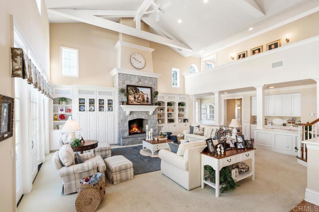 3056 Wildflower Drive Encinitas, CA 92024 - Photo 17 of 56 a living room with furniture and fireplace
