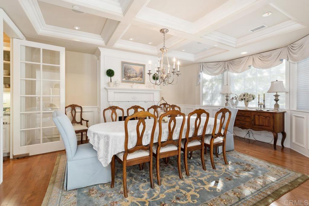 3056 Wildflower Drive Encinitas, CA 92024 - Photo 24 of 56 a view of a dining room with furniture window and wooden floor