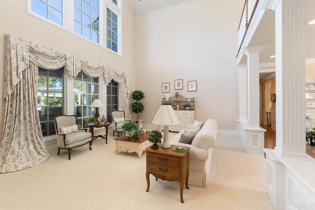 3056 Wildflower Drive Encinitas, CA 92024 - Photo 25 of 56 a living room with furniture and a potted plant