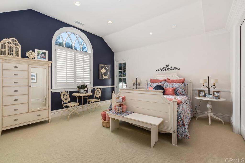 3056 Wildflower Drive Encinitas, CA 92024 - Photo 42 of 56 a bedroom with furniture and a large window