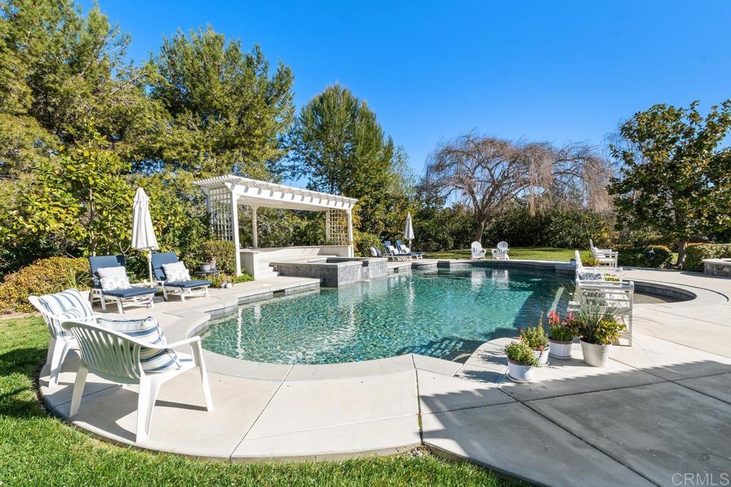 3056 Wildflower Drive Encinitas, CA 92024 - Photo 51 of 56 a view of a swimming pool with a patio