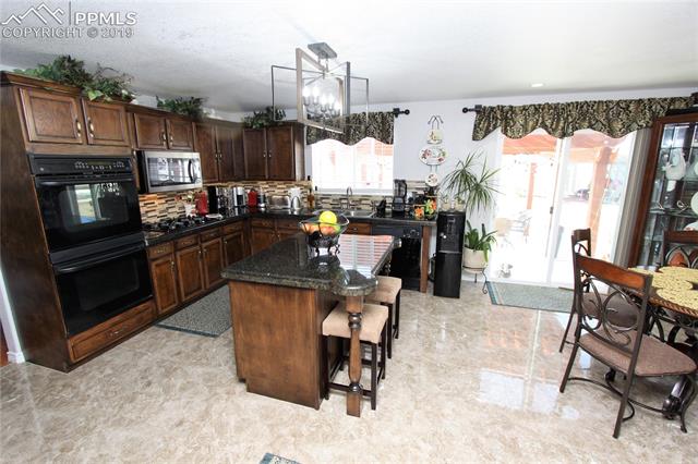 8580 Del Rio Road Peyton, CO 80831 - Photo 8 of 34
