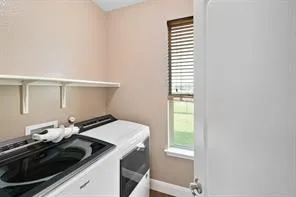 a kitchen with a stove and a window