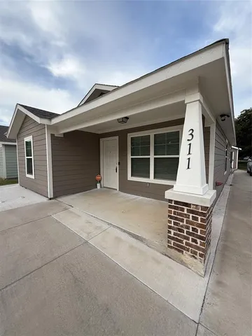 a front view of a house with windows