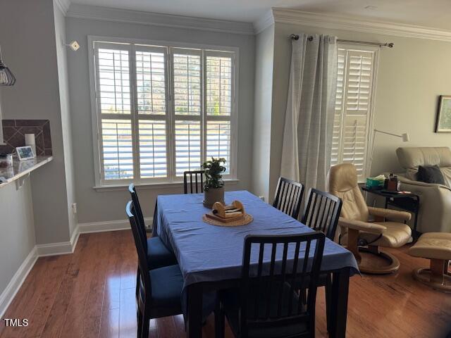 336 King Lear Lane Morrisville, NC 27560 - Photo 3 of 5 a view of a dining room with furniture window and wooden floor