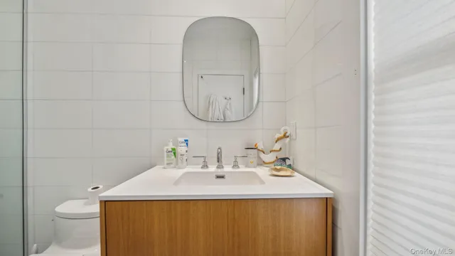 a bathroom with a sink and a toilet