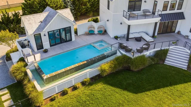 swimming pool with an outdoor seating