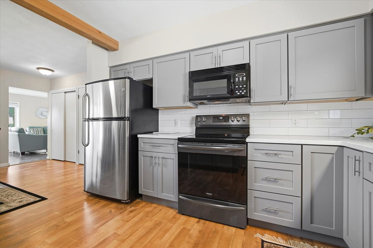 203 Highview Drive Eureka, IL 61530 - Photo 13 of 49 a kitchen with a refrigerator stove and microwave