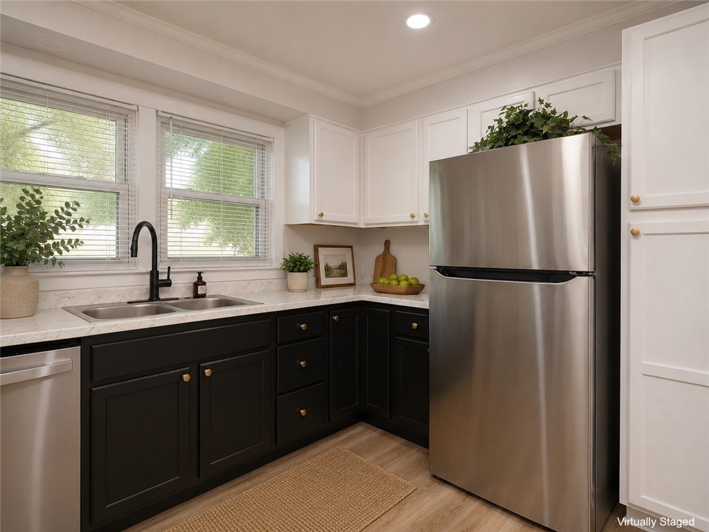 3517 Shawnee Avenue Anderson, SC 29626 - Photo 5 of 25 A well-appointed kitchen features stainless steel appliances and abundant natural light from double windows.