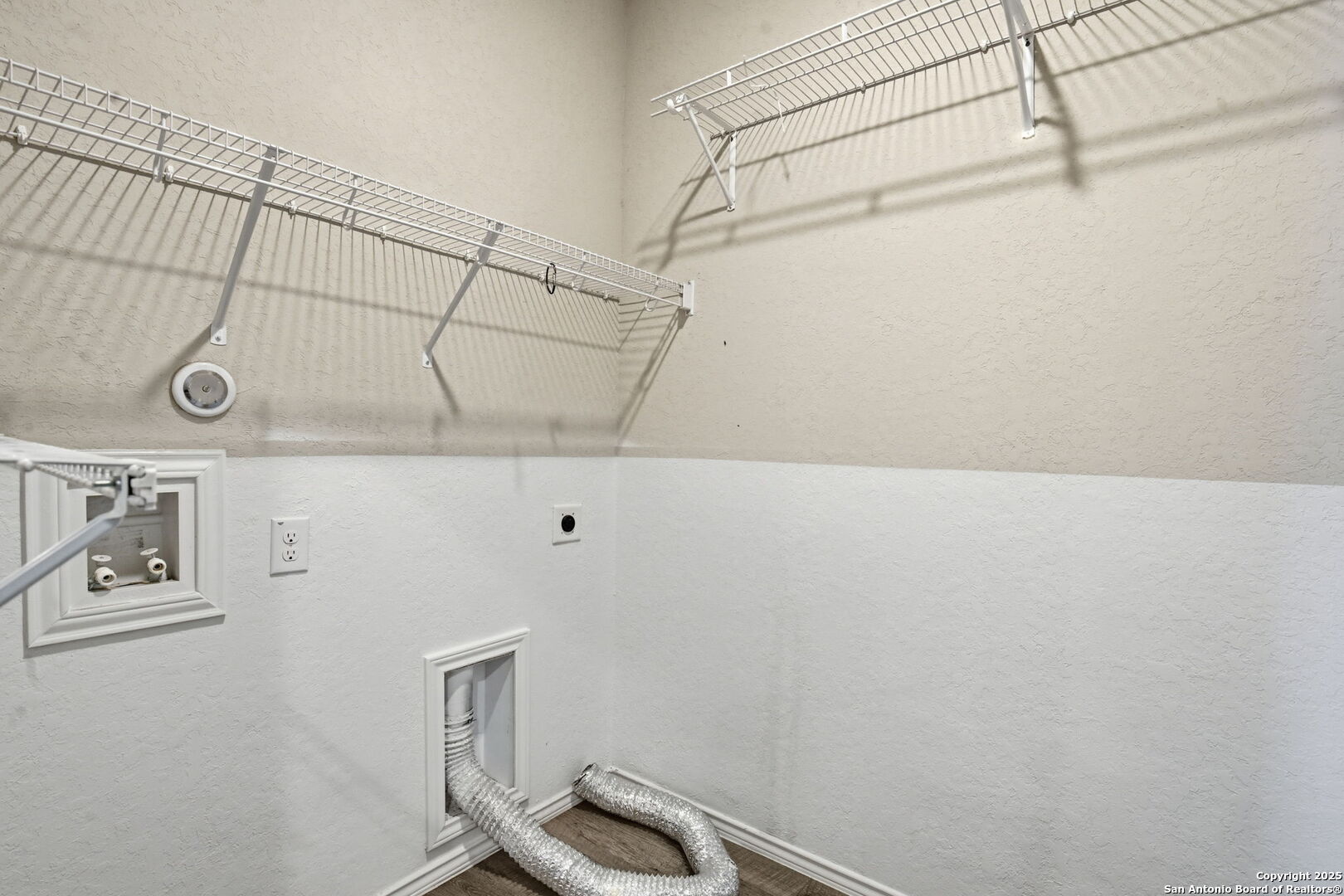 7338 Storm Moon Converse, TX 78109 - Photo 11 of 31 a view of small space with empty racks on the wall