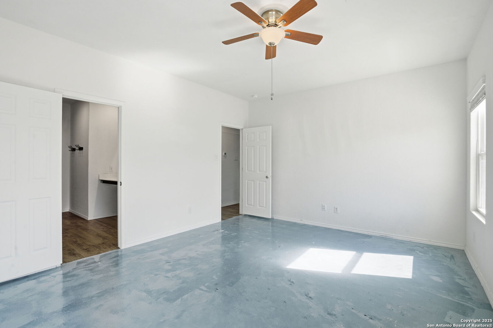 7338 Storm Moon Converse, TX 78109 - Photo 13 of 31 an empty room with fan