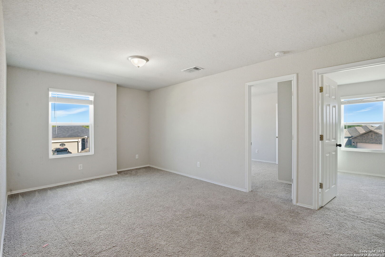 7338 Storm Moon Converse, TX 78109 - Photo 16 of 31 a view of an empty room with a window
