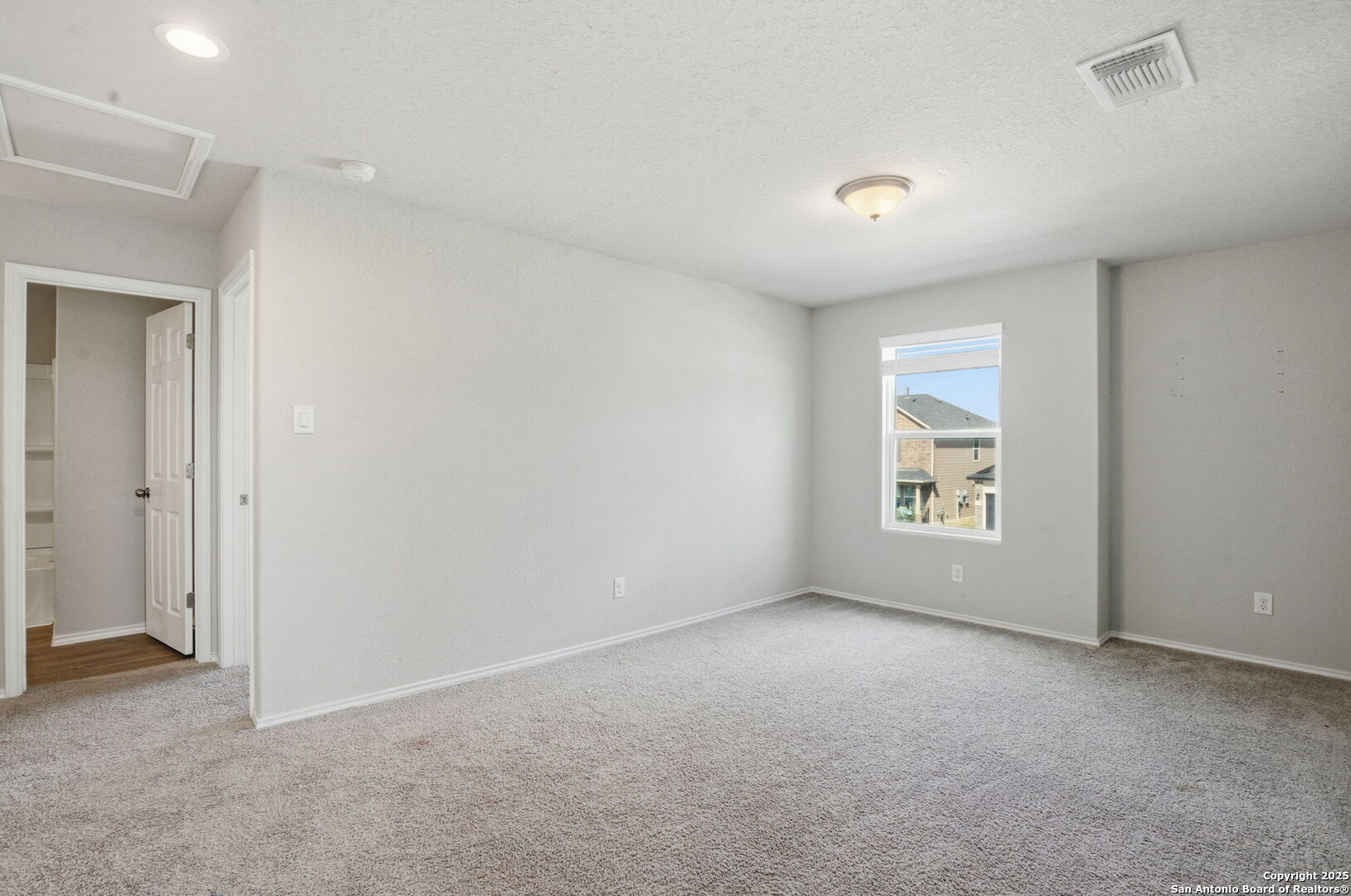 7338 Storm Moon Converse, TX 78109 - Photo 17 of 31 an empty room with windows
