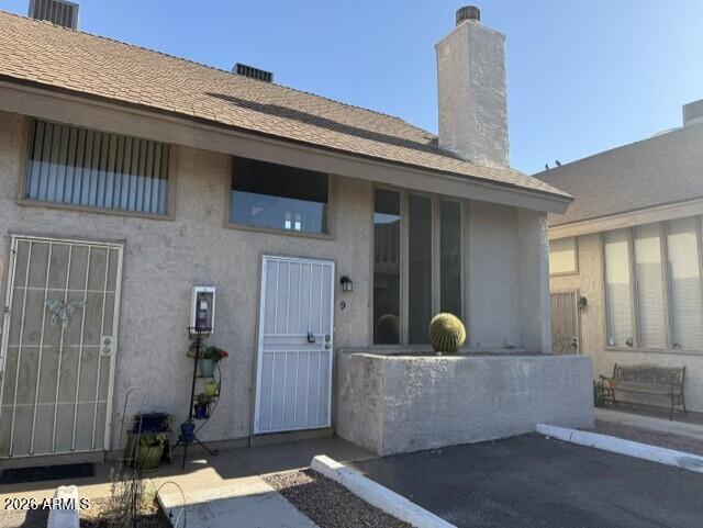 4240 North Longview Avenue, Unit 9 Phoenix, AZ 85014 - Photo 12 of 13 a view of a house with a outdoor space