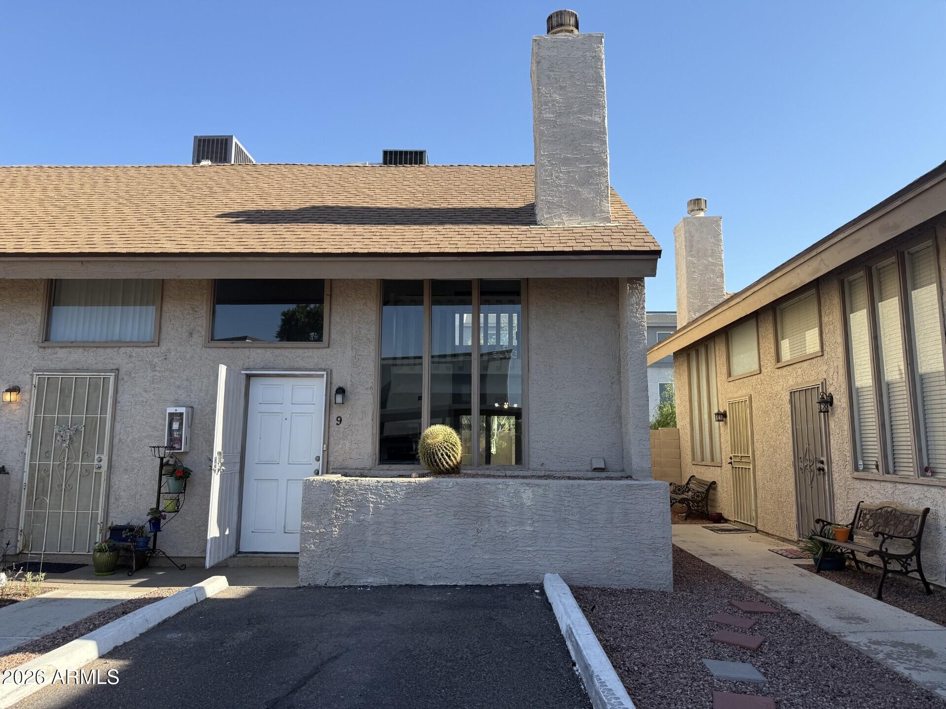 4240 North Longview Avenue, Unit 9 Phoenix, AZ 85014 - Photo 2 of 13 a view of a house with a patio