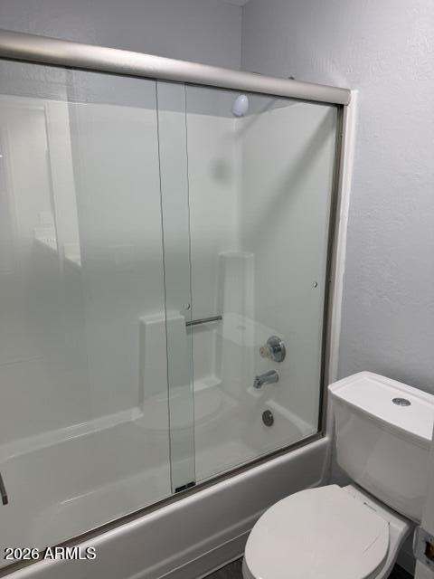 4240 North Longview Avenue, Unit 9 Phoenix, AZ 85014 - Photo 10 of 13 a bathroom with a toilet and a shower