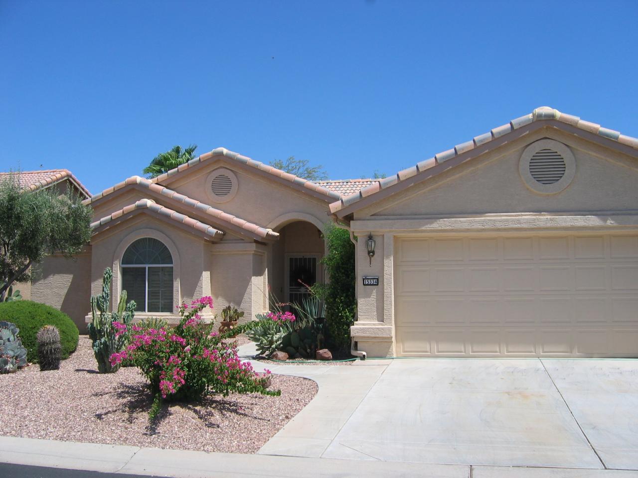 15334 Piccadilly Road Goodyear, AZ 85395 - Photo 1 of 10 Front view w/garage