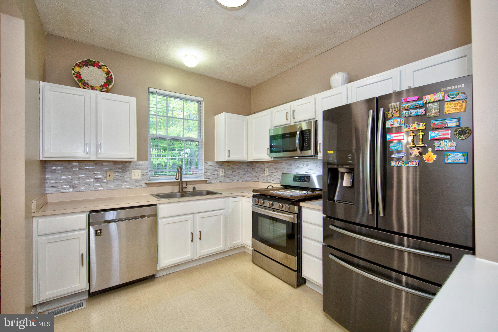 23 Caterham Court Rosedale, MD 21237 - Photo 11 of 27 Modern kitchen with sleek finishes.
