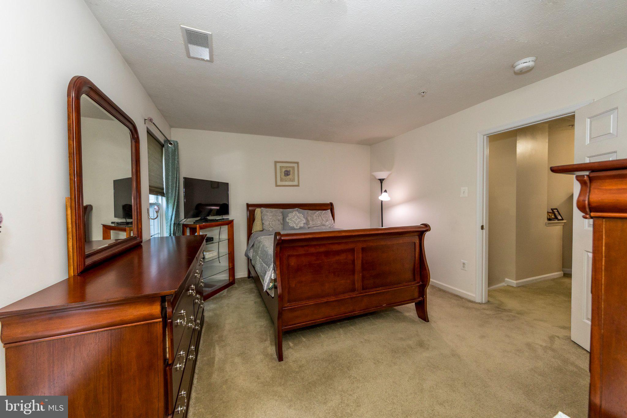 23 Caterham Court Rosedale, MD 21237 - Photo 13 of 27 Cozy bedroom with classic charm.