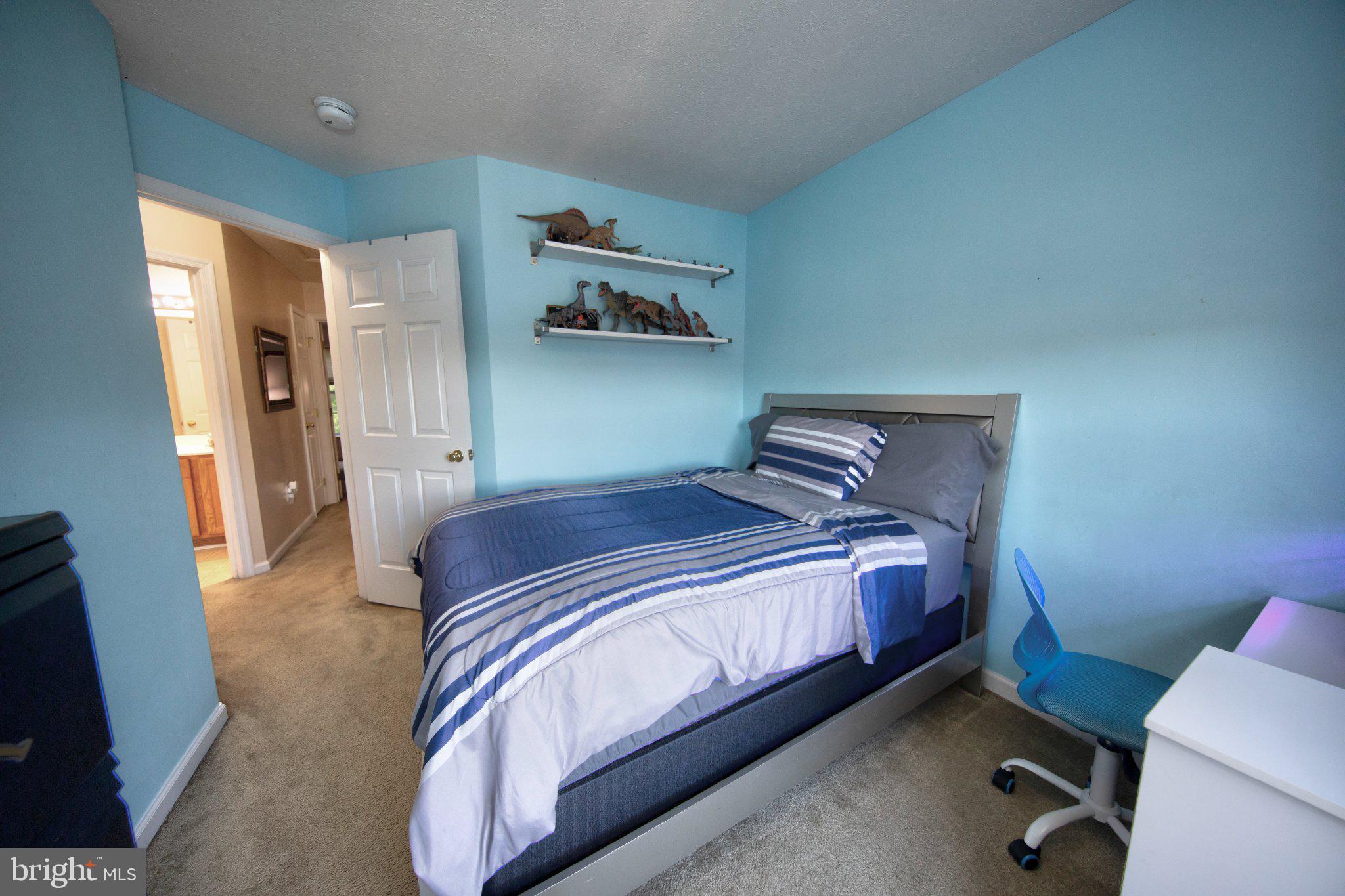 23 Caterham Court Rosedale, MD 21237 - Photo 15 of 27 Cozy blue-hued bedroom retreat.