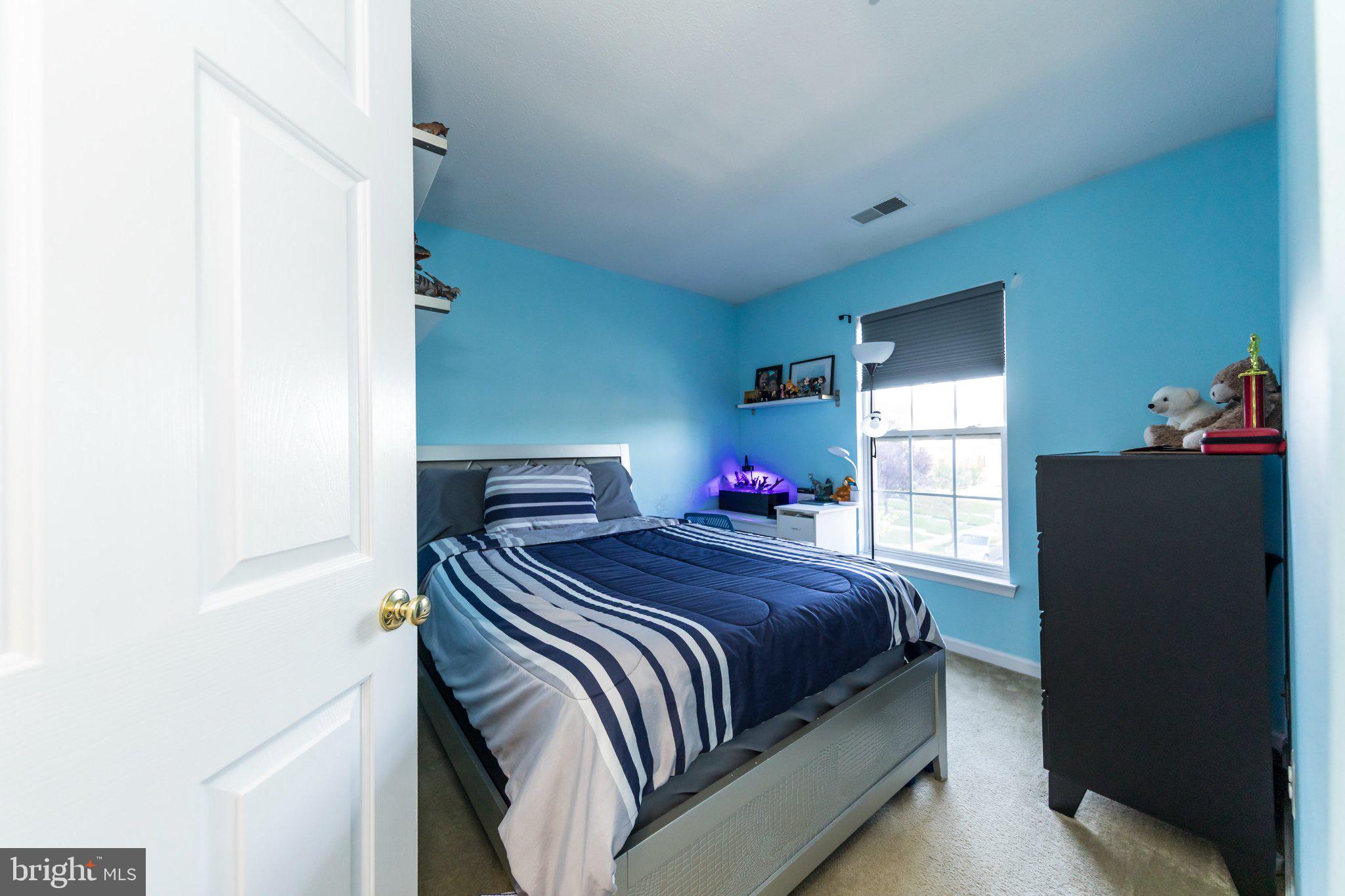 23 Caterham Court Rosedale, MD 21237 - Photo 16 of 27 Cozy retreat with calming blue hues.