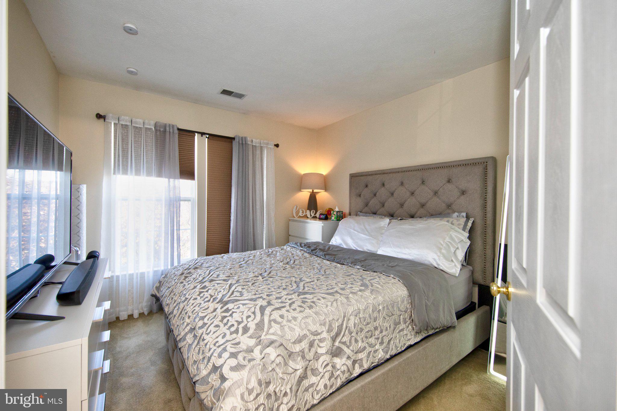 23 Caterham Court Rosedale, MD 21237 - Photo 17 of 27 Cozy bedroom with natural light.