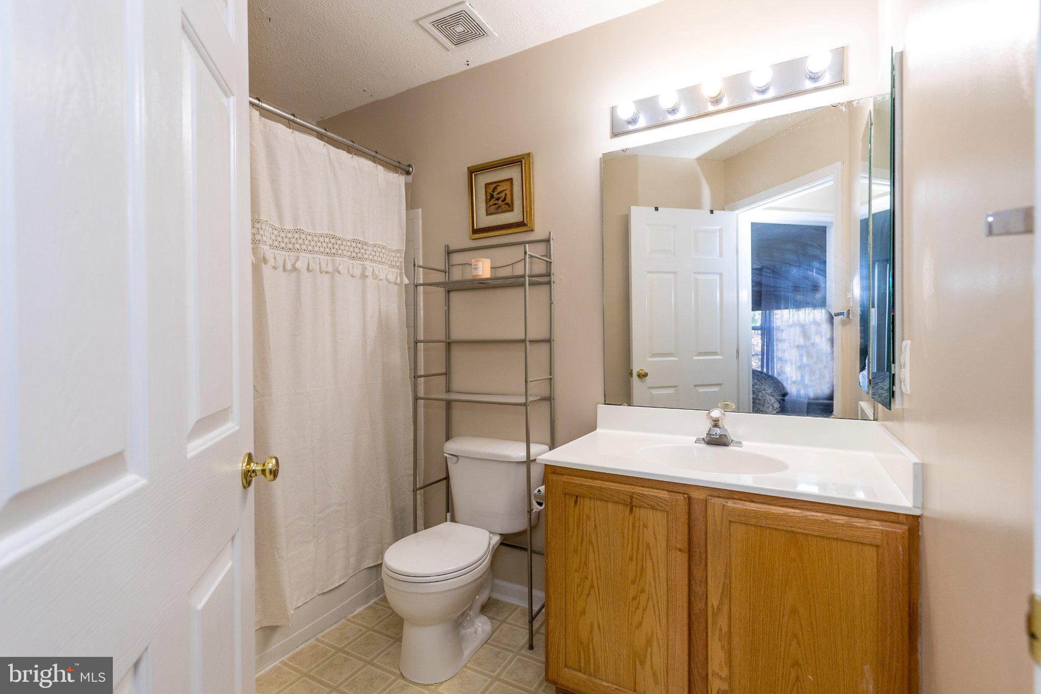 23 Caterham Court Rosedale, MD 21237 - Photo 19 of 27 Bright and inviting bathroom retreat.