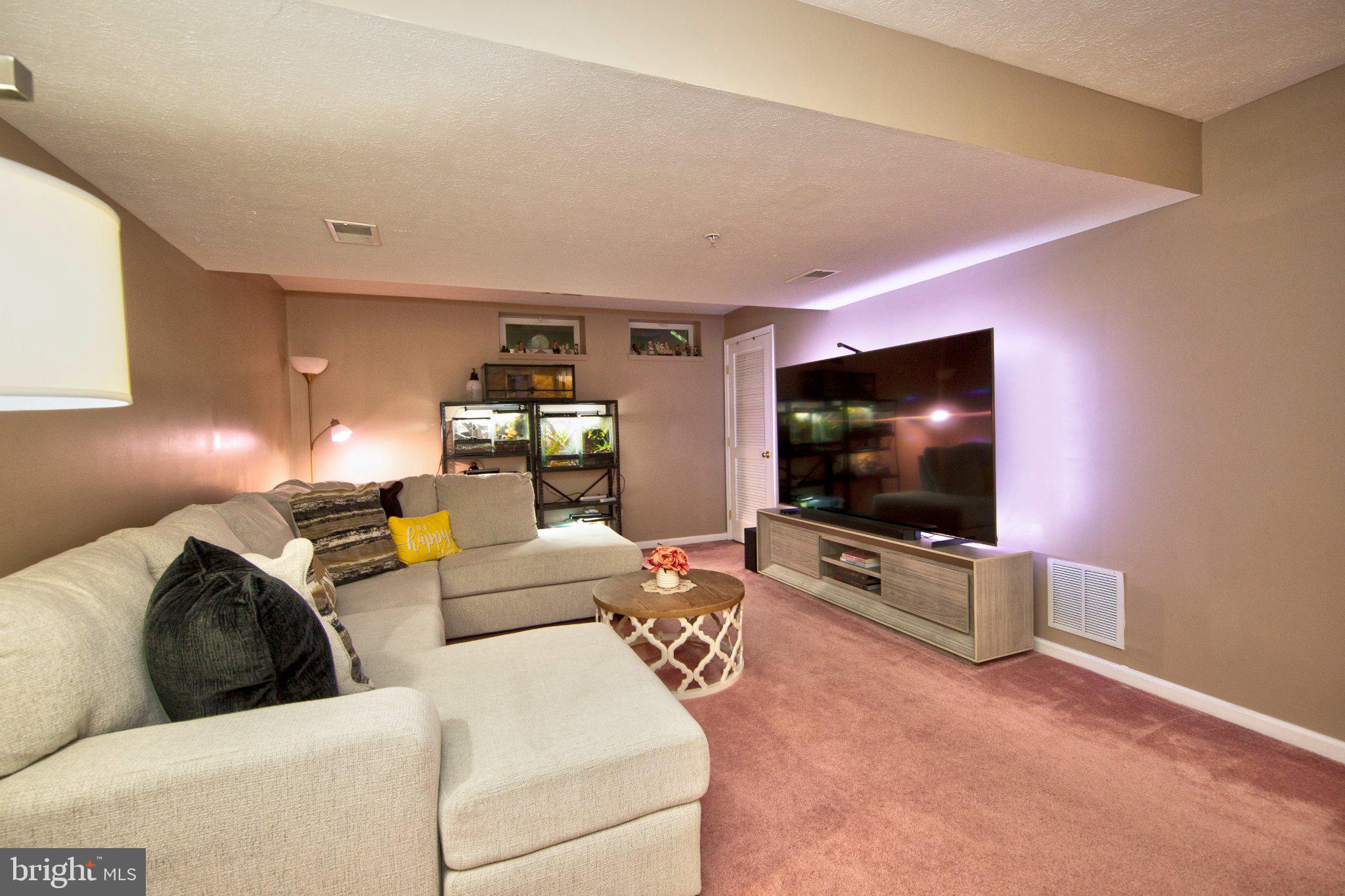 23 Caterham Court Rosedale, MD 21237 - Photo 20 of 27 Cozy basement retreat for relaxation.