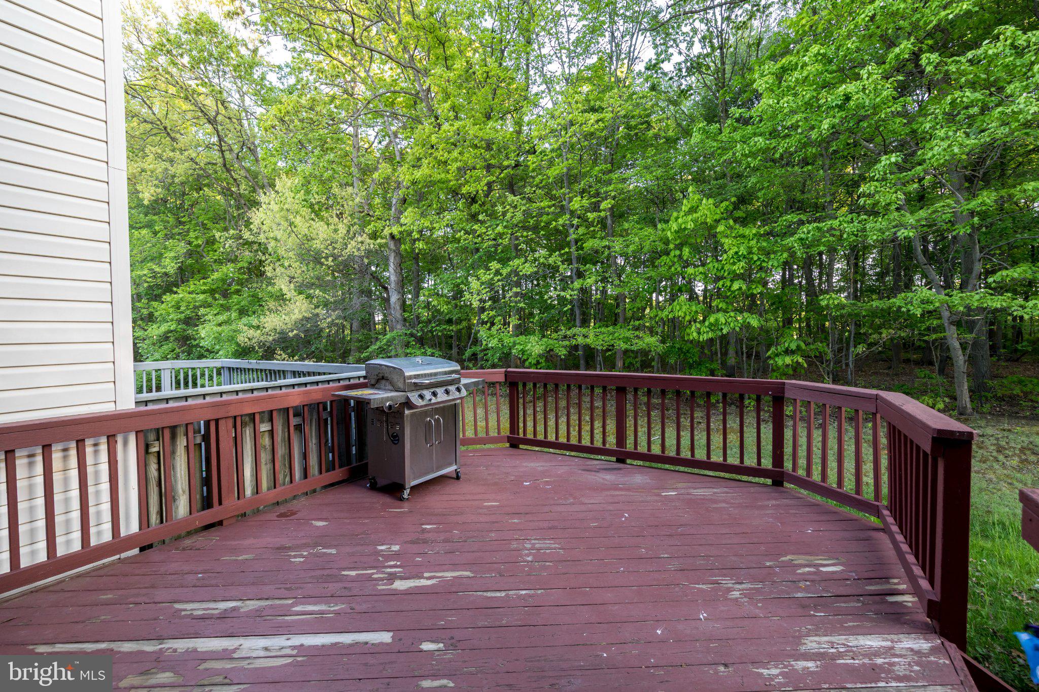 23 Caterham Court Rosedale, MD 21237 - Photo 24 of 27 Serene deck overlooking lush greenery.