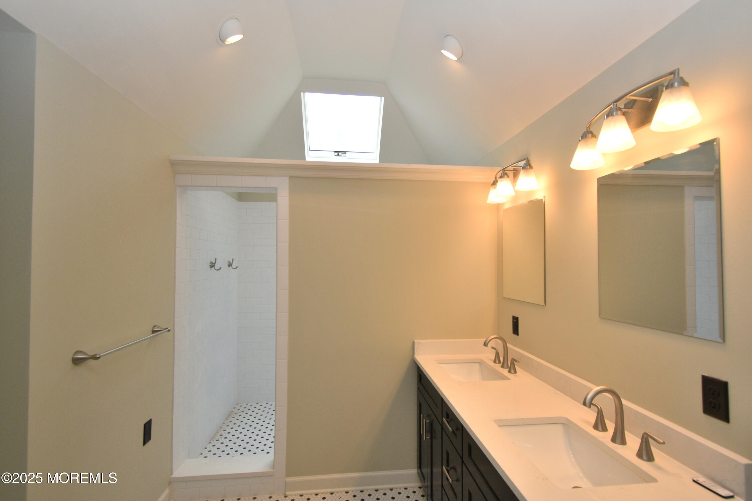 324 A Broad Street Keyport, NJ 07735 - Photo 11 of 19 a bathroom with a double vanity sink a mirror and shower