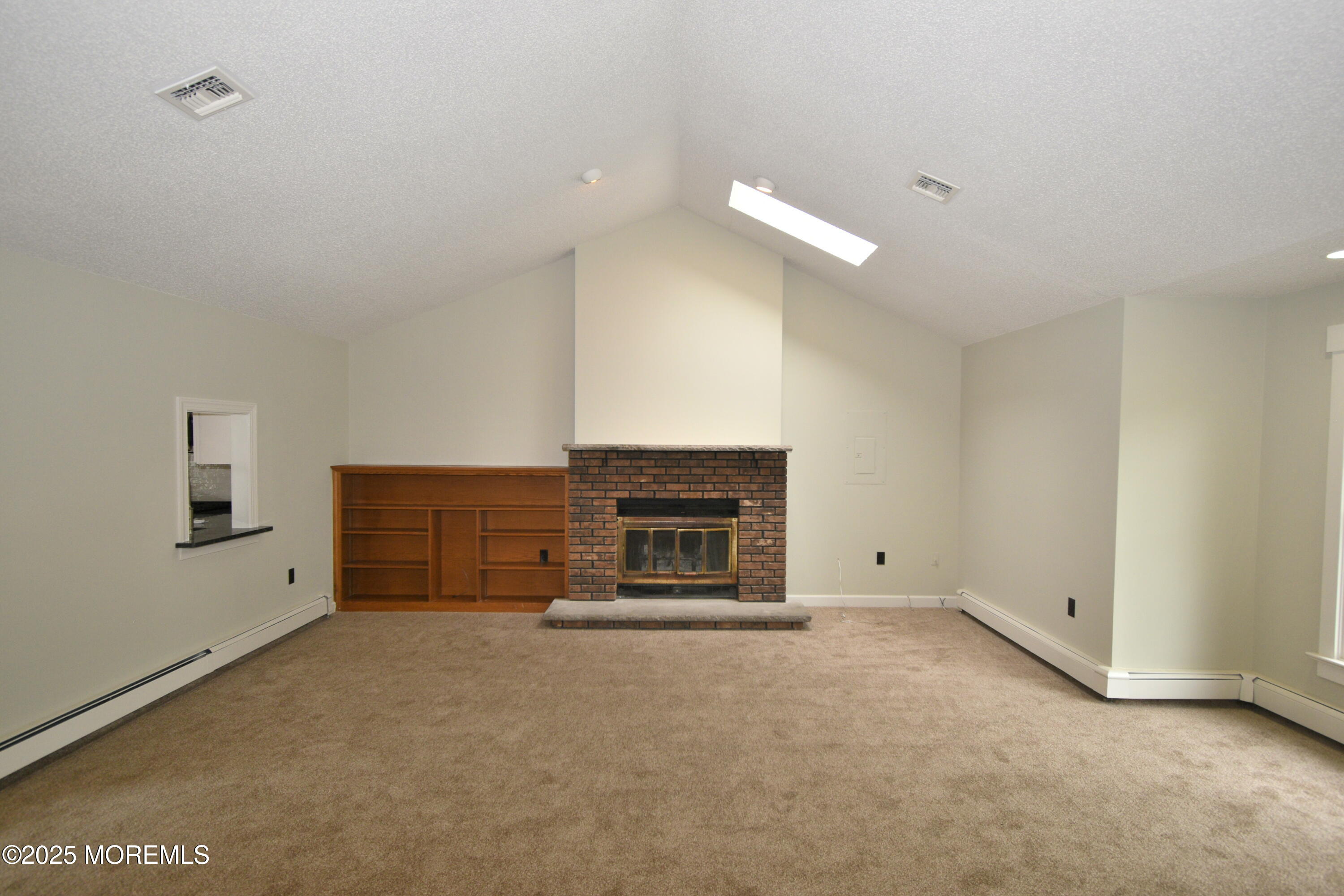 324 A Broad Street Keyport, NJ 07735 - Photo 5 of 19 a view of empty room with a fireplace