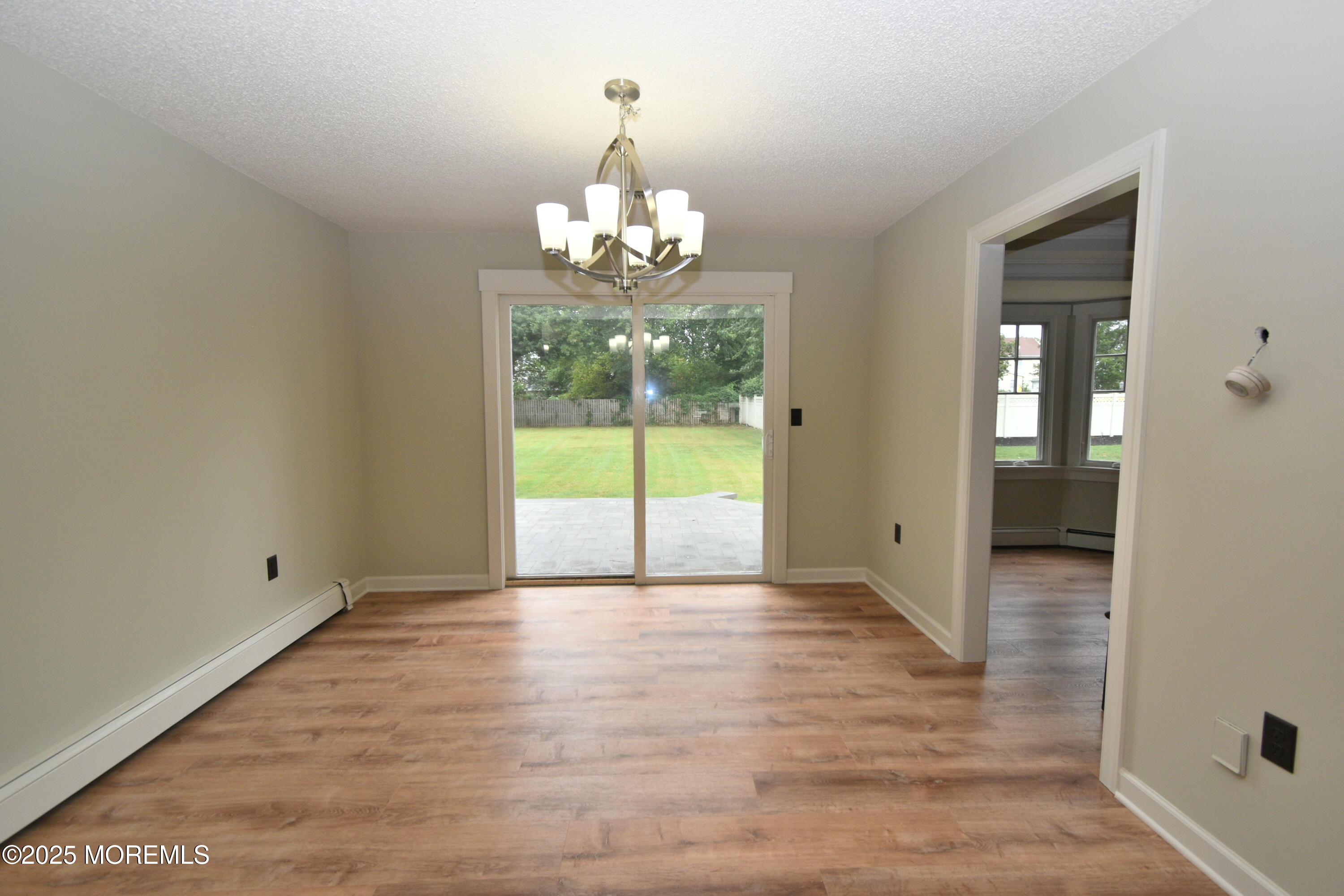 324 A Broad Street Keyport, NJ 07735 - Photo 8 of 19 a view of an empty room with a window