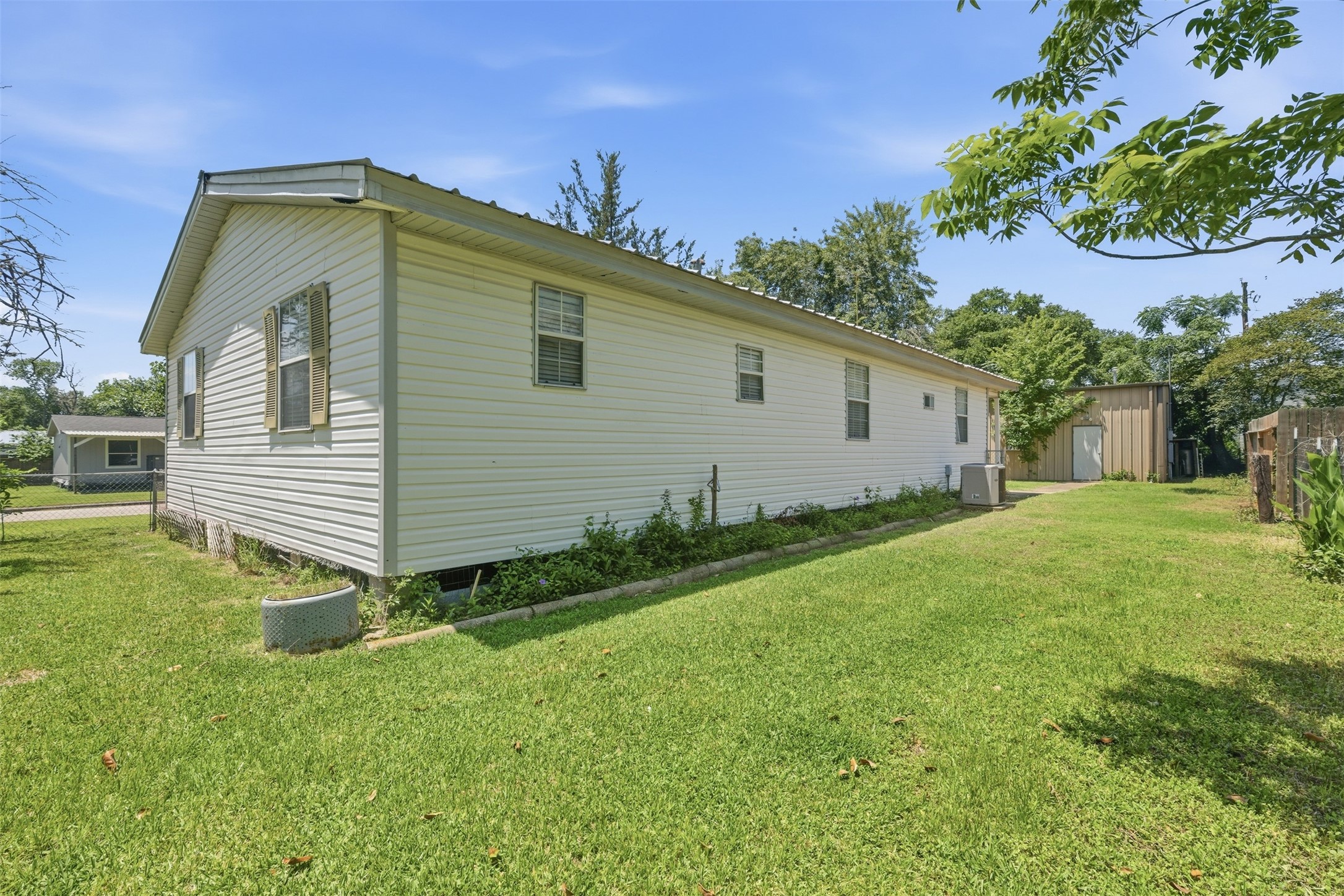 1310 Brazos Street Hempstead, TX 77445 - Photo 21 of 32 a view of a backyard of the house