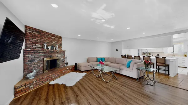 a living room with furniture or fireplace and a flat screen tv