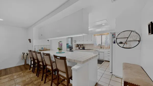 a view of a dining room kitchen and a window
