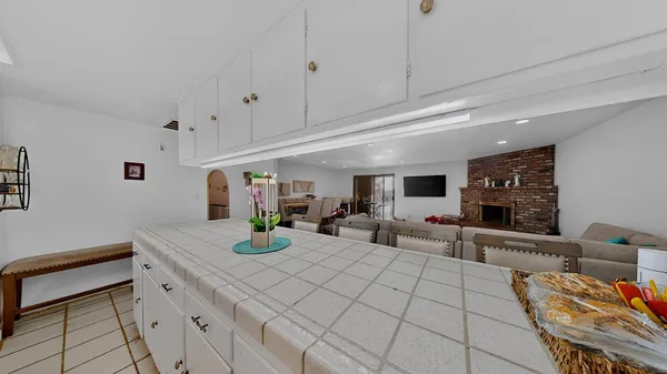 a view of living room with furniture and flat screen tv