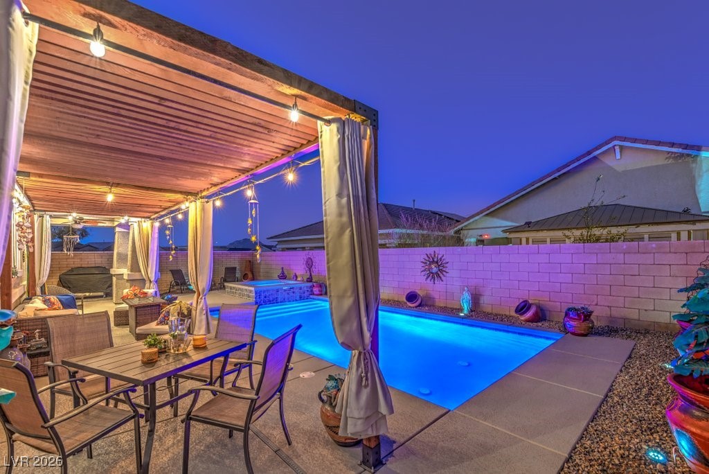 345 Silva Place Henderson, NV 89011 - Photo 34 of 68 Customizable LED lighting, wide stairs, and integrated hot tub make this your own private oasis.