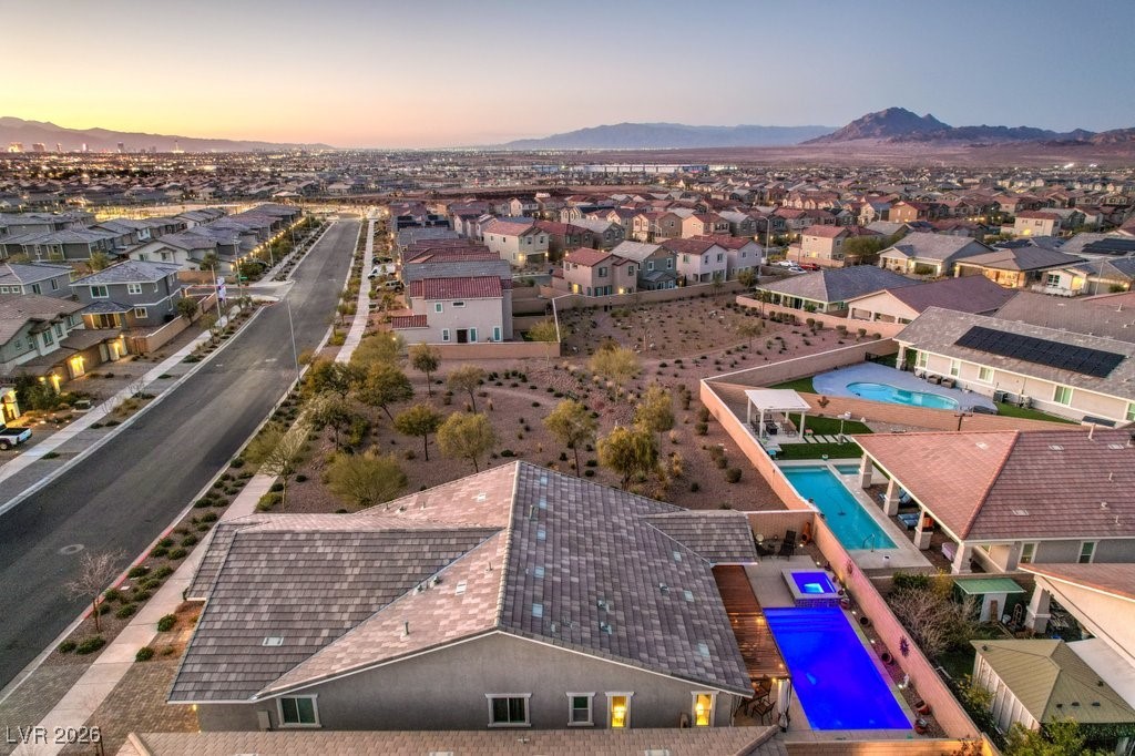 345 Silva Place Henderson, NV 89011 - Photo 45 of 68 The home is adjacent to one of the community parks / greenbelts. This view is facing North.