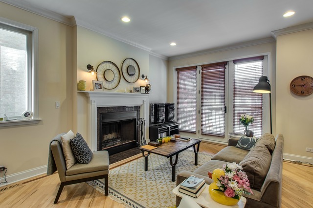 2629 West Haddon Avenue, Unit 2 Chicago, IL 60622 - Photo 2 of 8 a living room with furniture and a fireplace